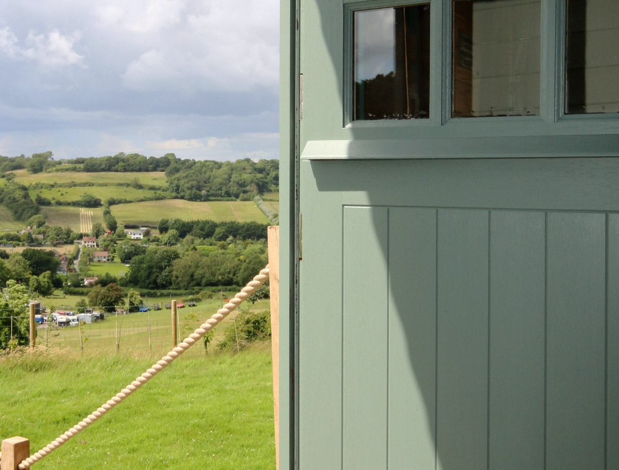Looking out of the Shepherds hut at the countryside in Alkham